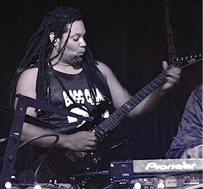 Mark Anthony, Nappy Soldier, playing guitar