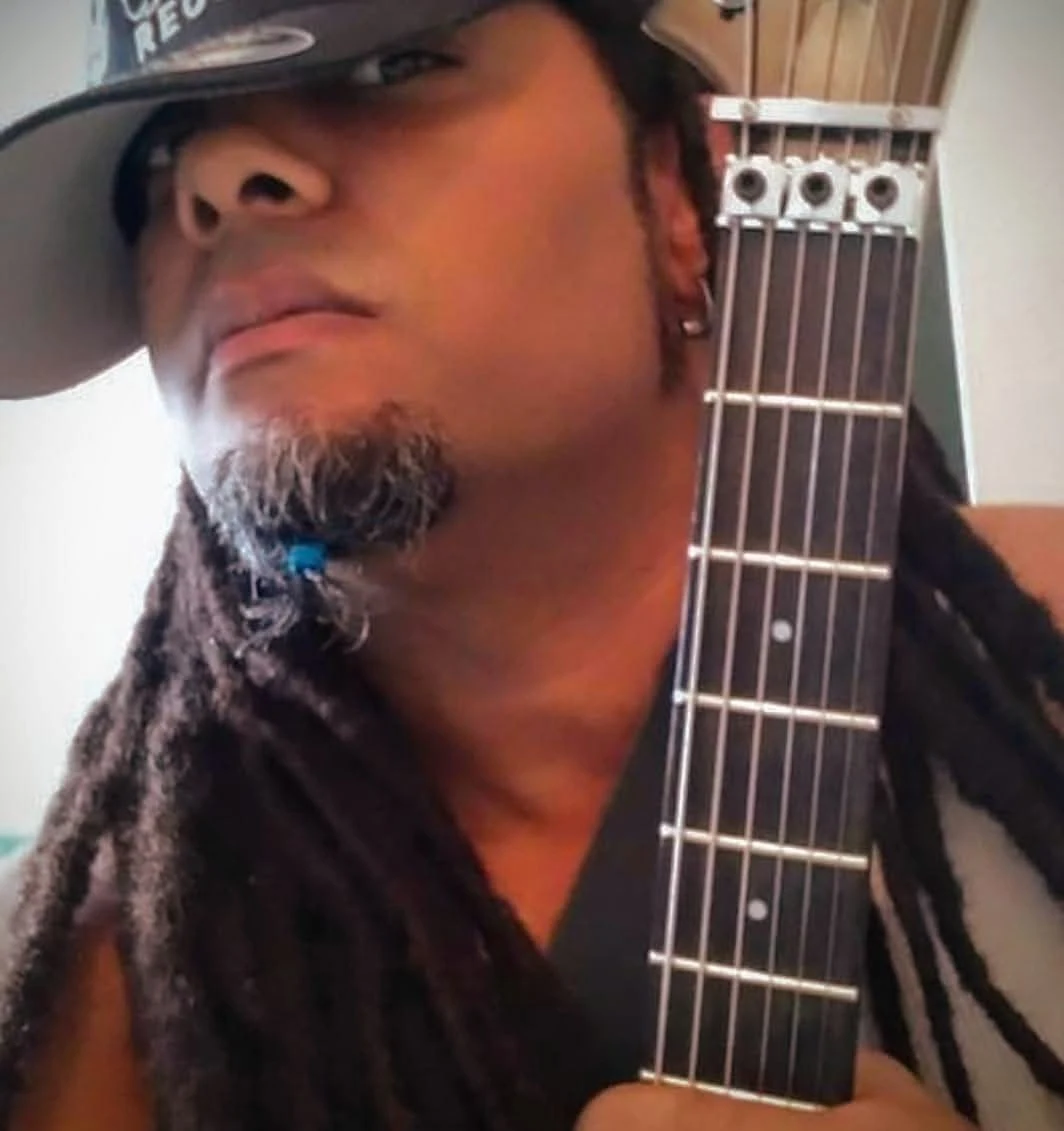 Nappy Soldier portrait with guitar